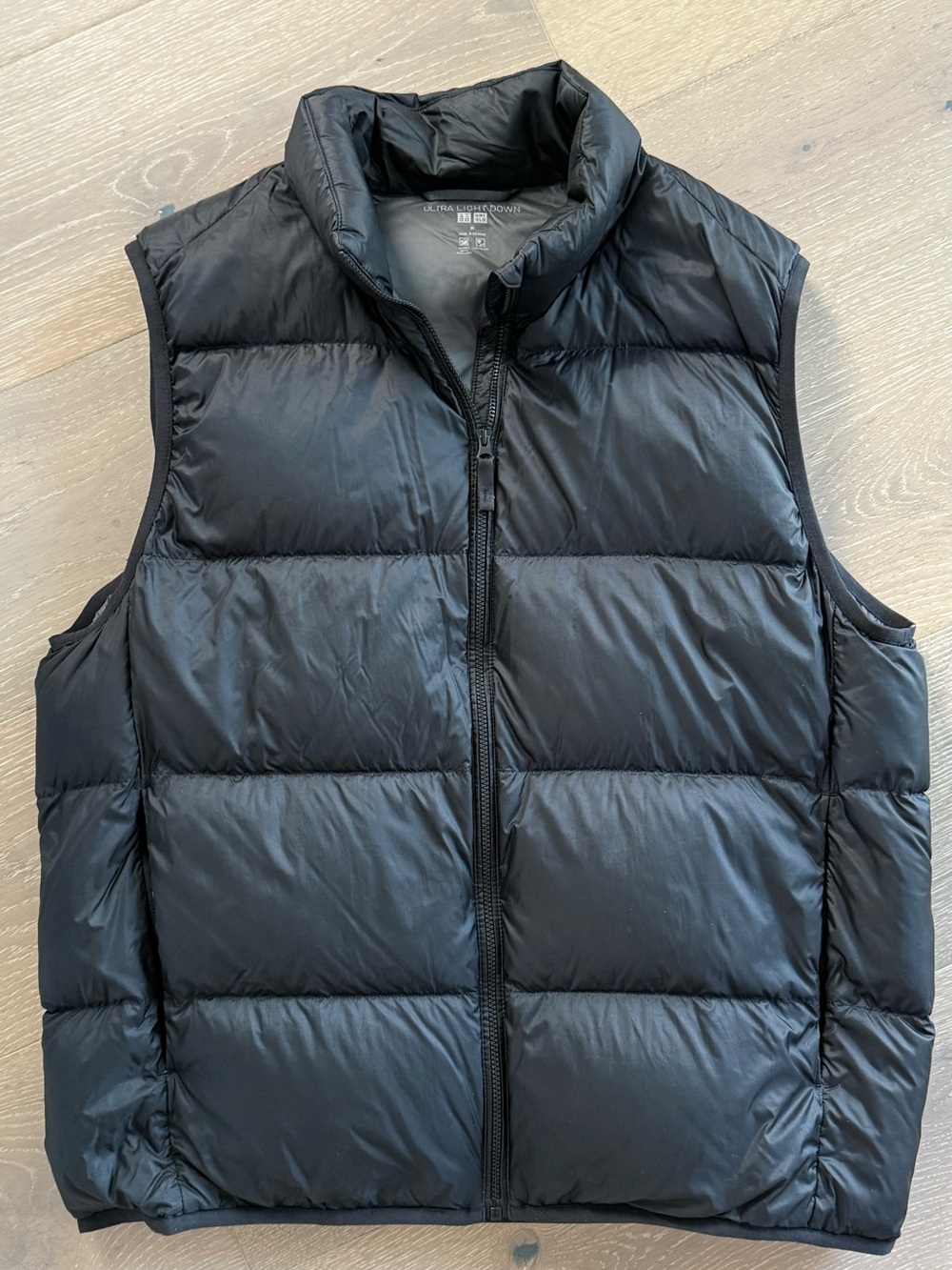 Uniqlo Men's Black Puffer Vest - Medium. Excellent condition.
